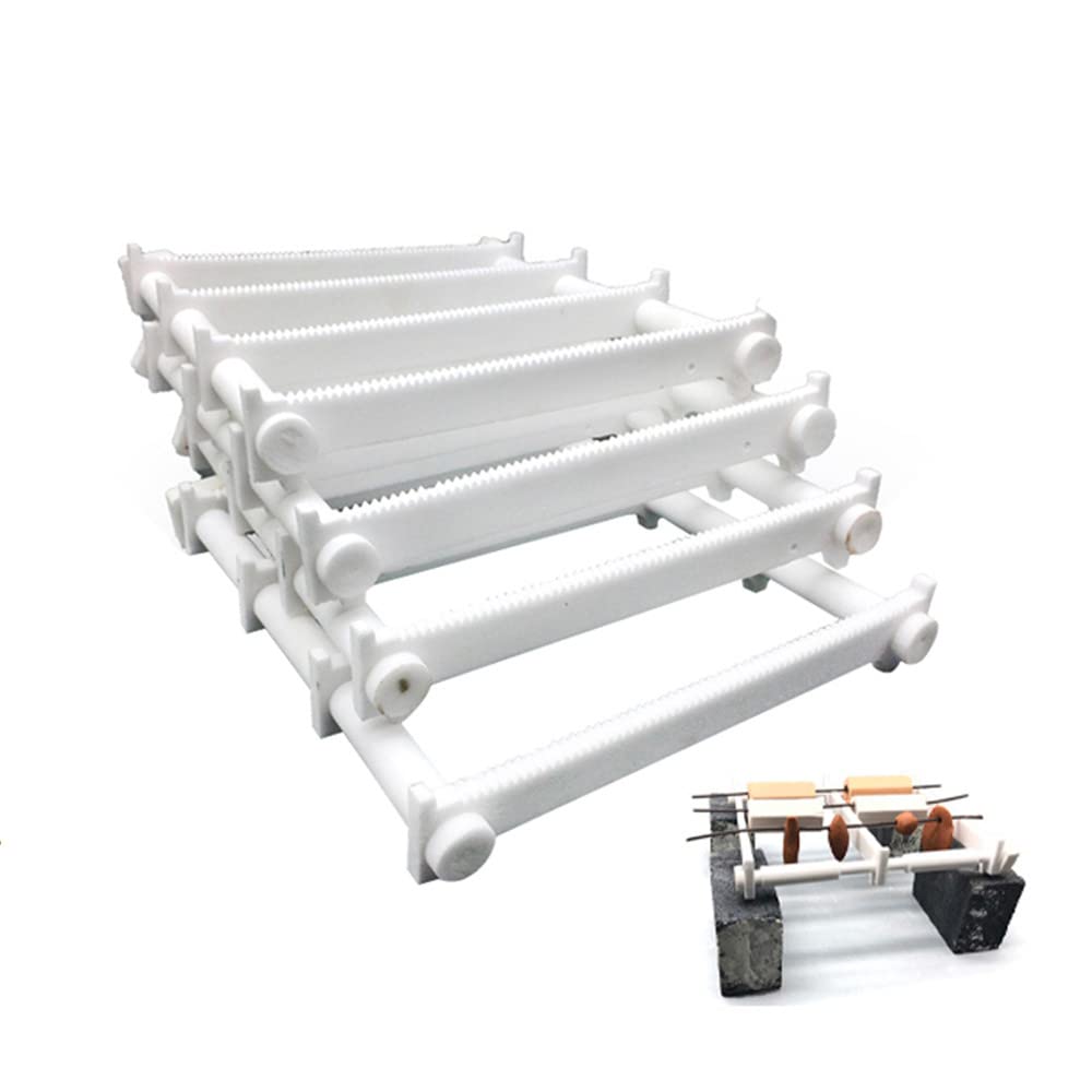White plastic ladder-like structure with a miniature grill and food