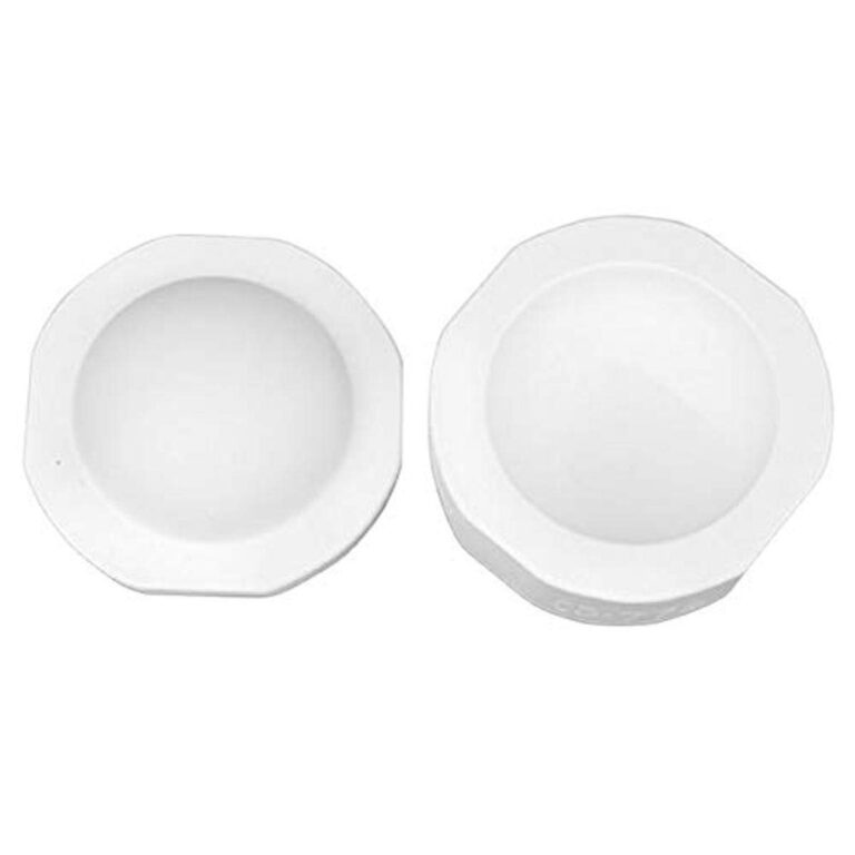 Two white, octagonal, shallow bowls, side by side, on a white background