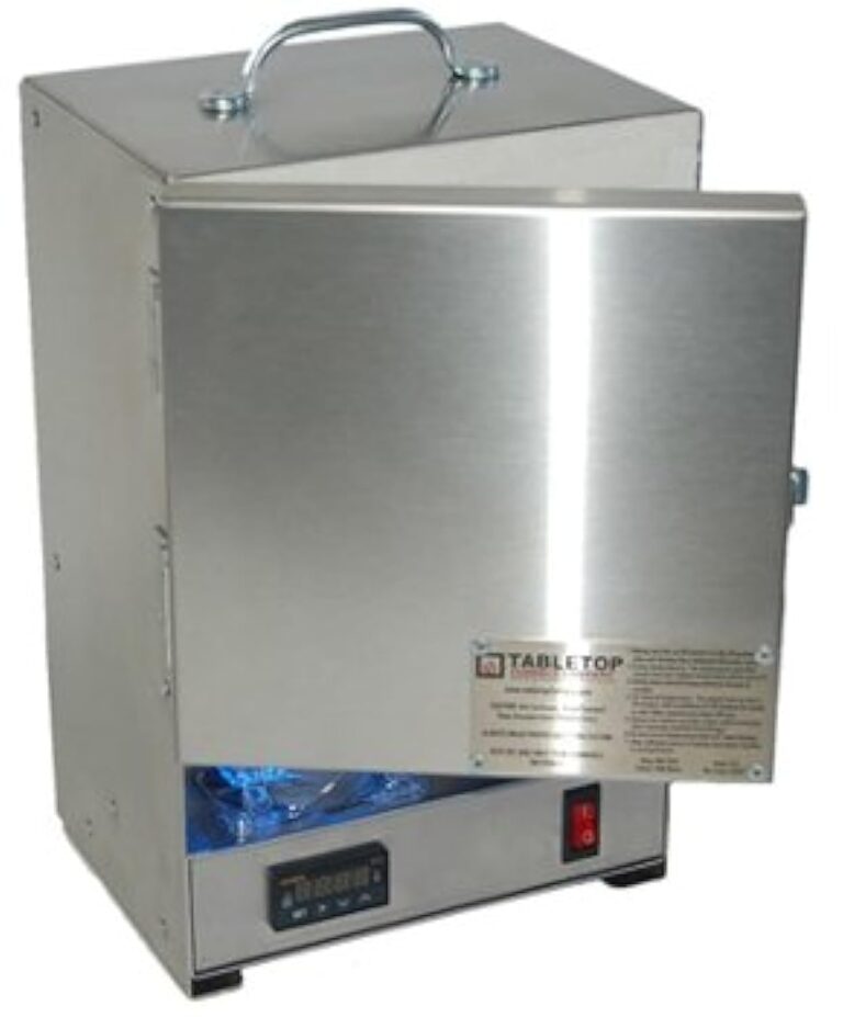 Stainless steel tabletop oven with open door, handle, and digital display