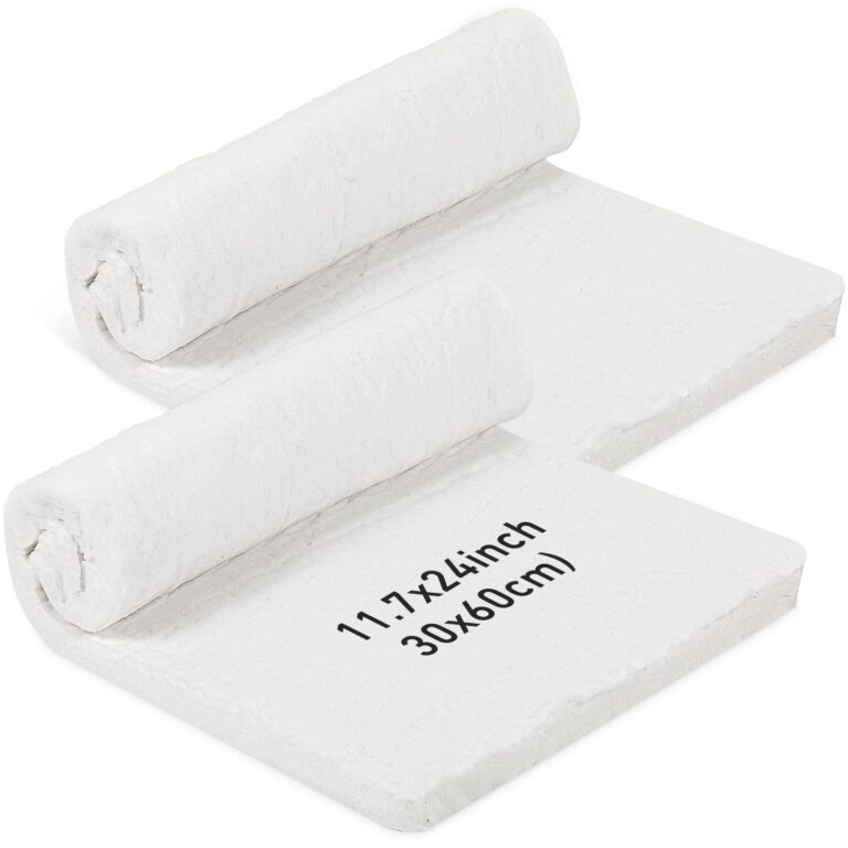 Two white ceramic fiber blankets, one rolled, with size information printed