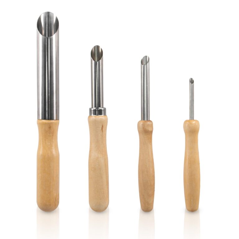 Four stainless steel coring tools with wooden handles, different sizes