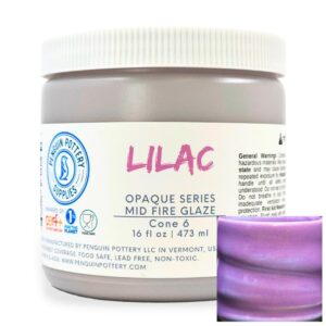 Lilac mid-fire glaze in a jar, with a sample of the glaze's color