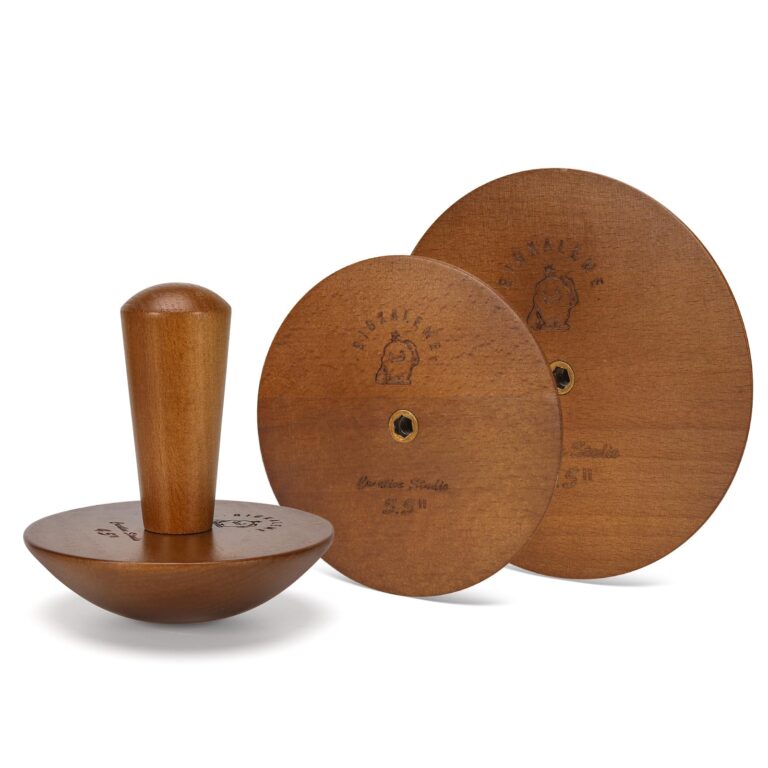 Wooden pottery tools: a bowl, a handle, and two circular turntables