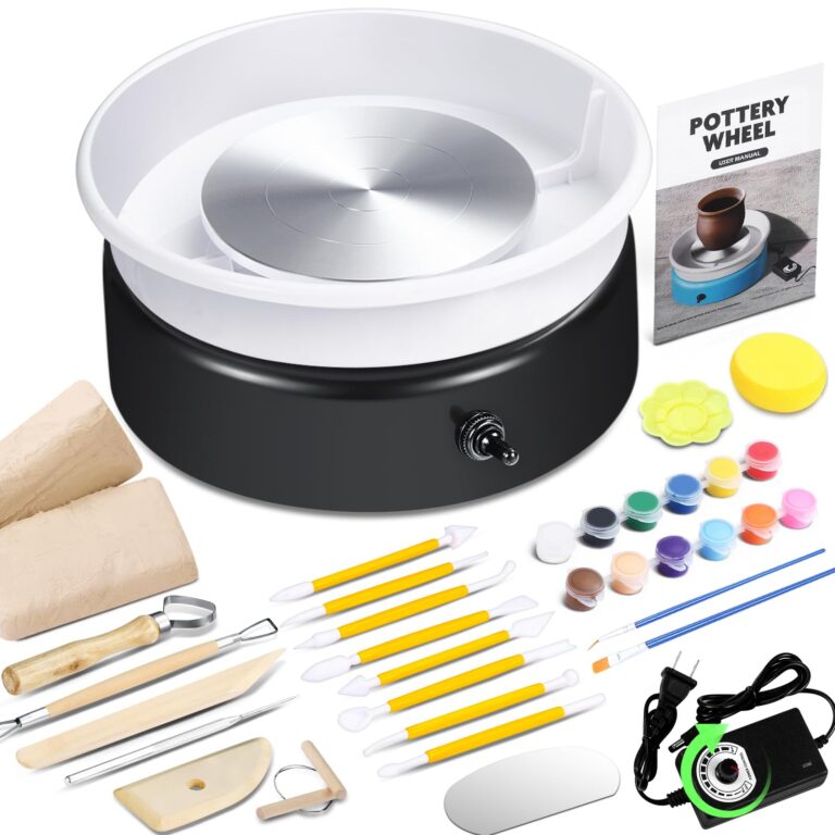 Pottery wheel kit with clay, tools, paints, and user manual