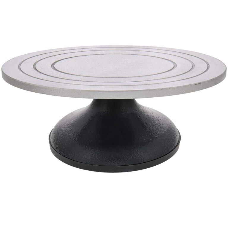 Pottery wheel with a black base and a silver, grooved top